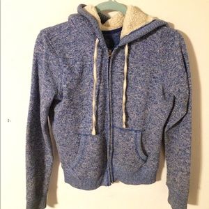 Blue woman’s zip up jacket